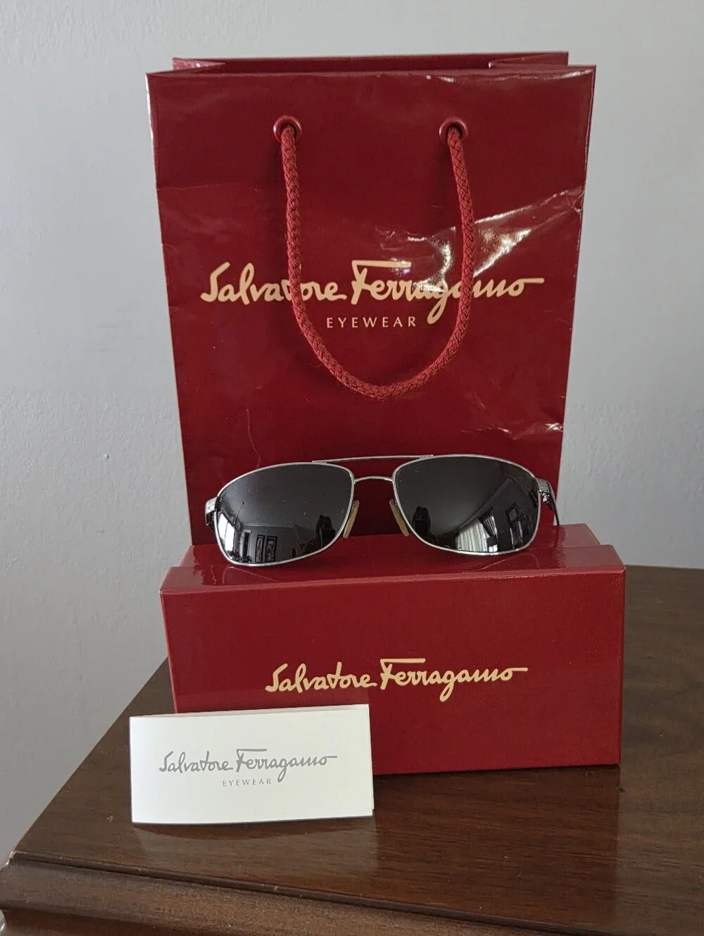 Salvatore Ferragamo Silver Frame Sunglasses with Black Lenses
